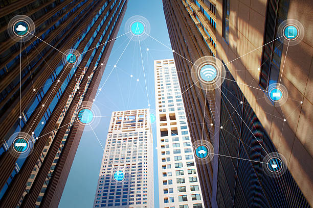istock Looking up lower angle exterior commercial building 607606312