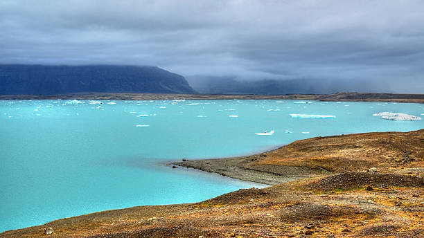 istock Icebergs in Jokulsarlon Glacier Lagoon, Iceland 607606554