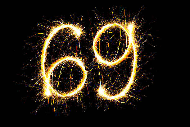 istock Number 69 made with sparklers 607607394