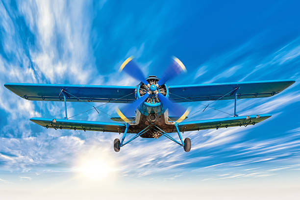 biplane picture of a biplane in the sky aerobatics photos stock pictures, royalty-free photos & images