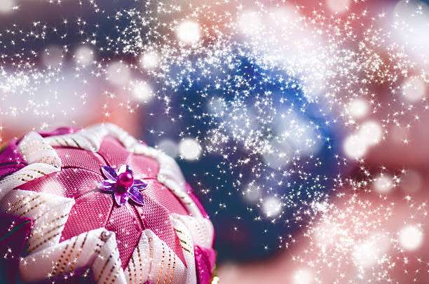 Christmas background, decoration. Christmas balls on a wooden table. Soft focus. Sparkles and bubbles. Abstract background. Vintage