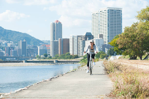 istock Woman riding a bicycle 607610230