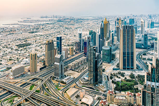 istock Modern Dubai cityscape at twilight, United Arab Emirates 607612554