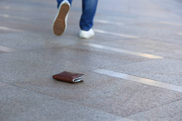 istock people lost leather wallet with money 607612684