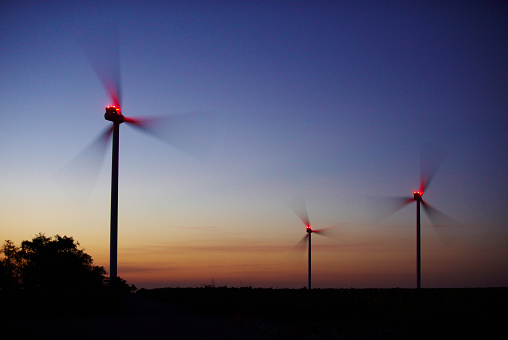 Wind turbines at night