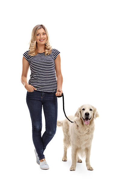 istock Young woman posing with her dog 607613282