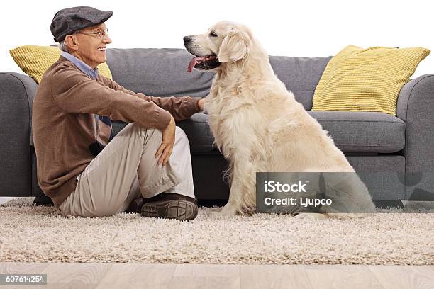 Senior And His Dog Looking At Each Other Stock Photo - Download Image Now - Dog, Senior Men, Senior Adult