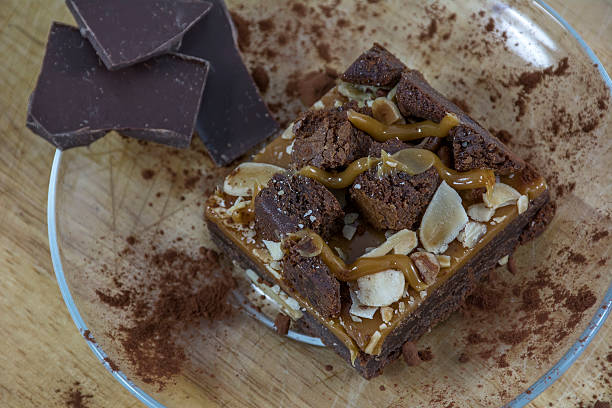 istock One piece of brownie with cocoa and chocolate 607614898