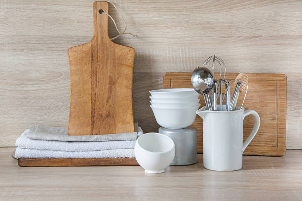 istock Crockery, utensils and other different stuff on wooden table.  Copyspace. 607621106