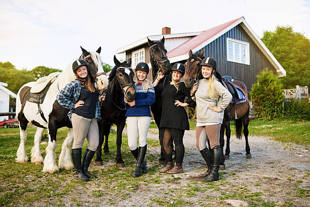 istock Real women ride horses 607621814