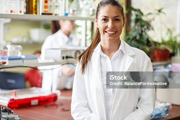 Young Female Scientist Stock Photo - Download Image Now - Scientist, Laboratory, Females