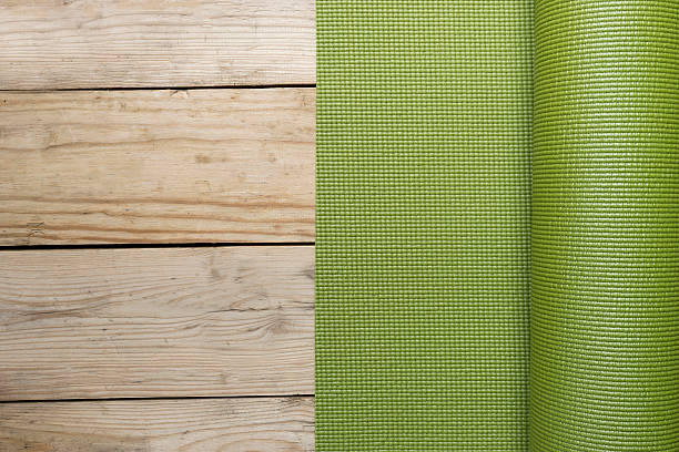 yoga mat on the wood table