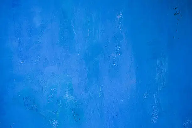 Photo of Grunge wall painted blue texture