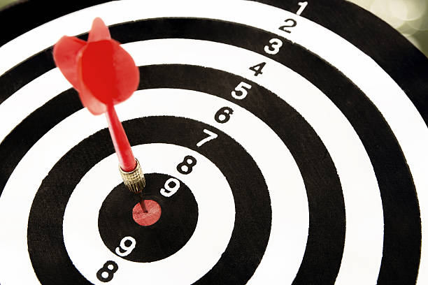 istock Red dart arrow hit target point center 607642502