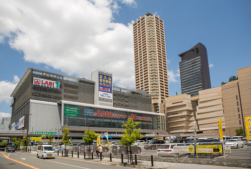 osaka, japan - June 2, 2016: People are driving around modern shopping mall at citycenter of osaka japan