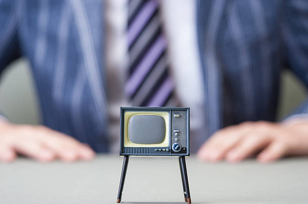 istock Businessman and TV 607648974