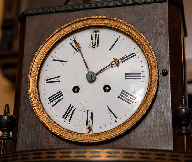 istock Vintage antique clock face closeup 607651934