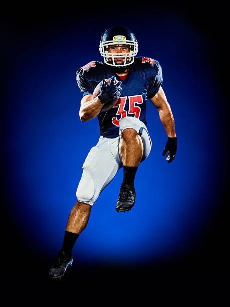 istock american football player man isolated 607652376
