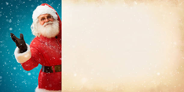 istock Smiling Santa Claus holding old paper banner 607653854