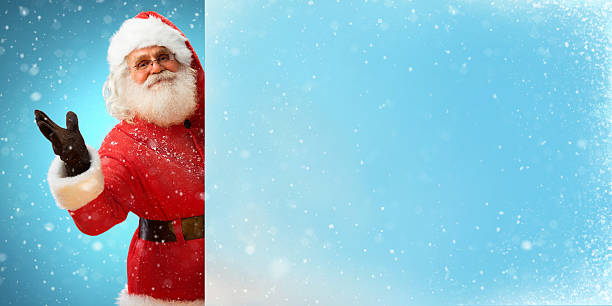 istock Jolly Santa Claus holding banner 607653942
