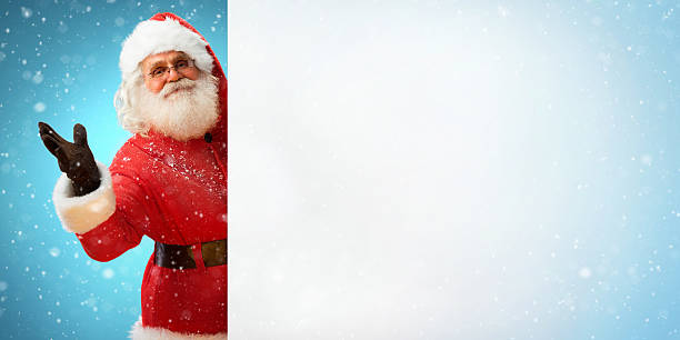 istock Santa Claus holding banner with  blank space for Your Text 607654068