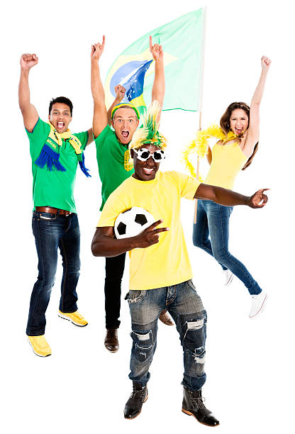 istock Four ecstatic Brazilian soccer fans cheering on their team 607729346