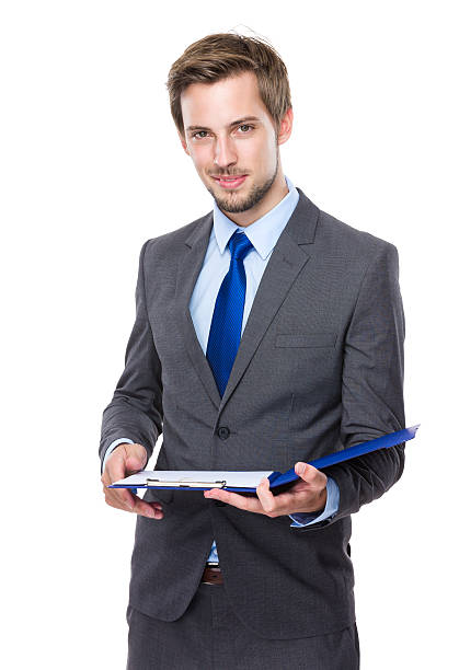 istock Businessman holding clipboard 607733806