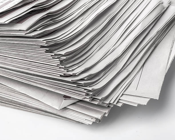 istock Pile of old newspapers 607735038