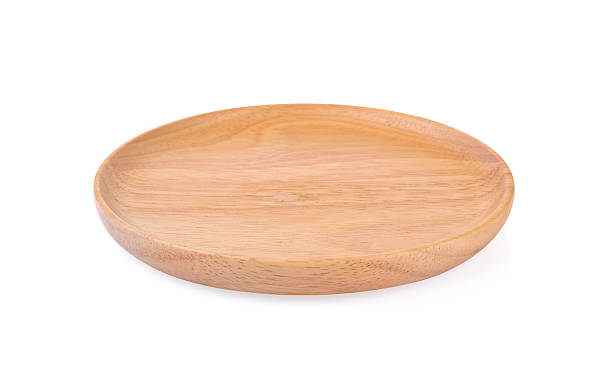 istock wooden  plate on white background 607737806