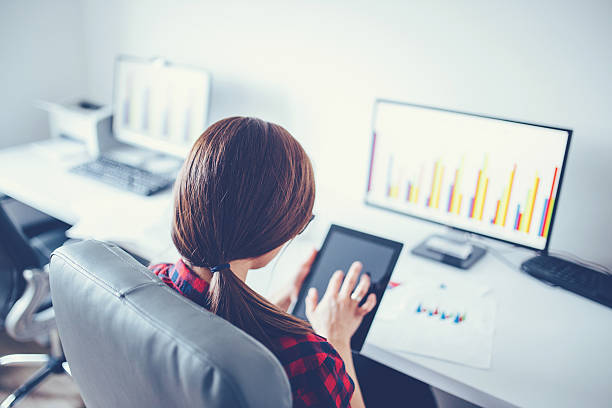 istock Girl works on tablet 607738714