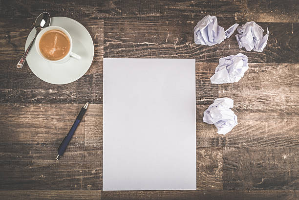 istock Writing a letter on an vintage hardwood table 607738932