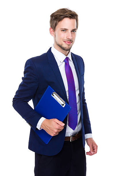 istock Businessman holding a clipboard 607739308