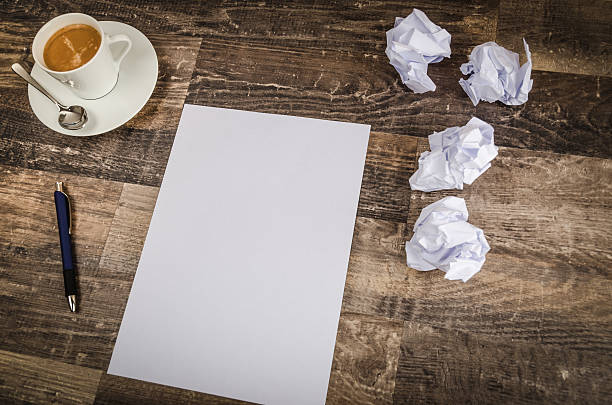 istock Writing a letter on an vintage hardwood table 607739422