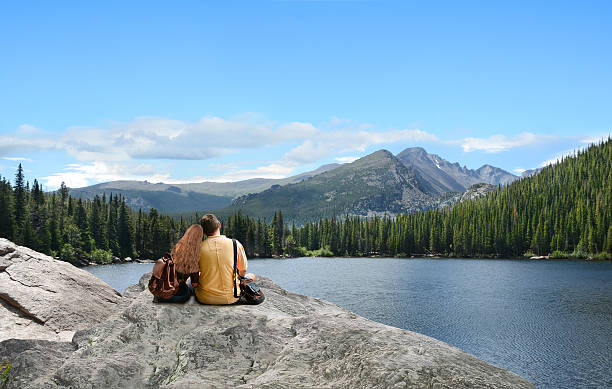 istock Loving couple  enjoying vacation in mountains. 607740114
