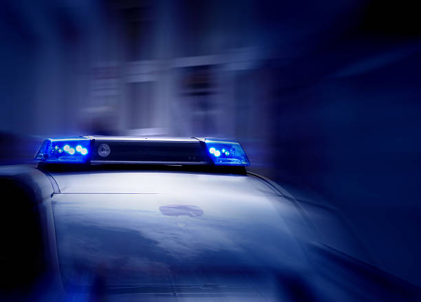 police car with blue lights switched on