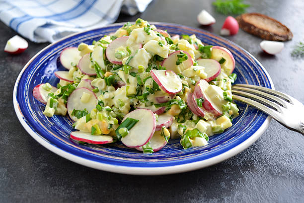 istock salad with radish, egg and wild garlic 607746072