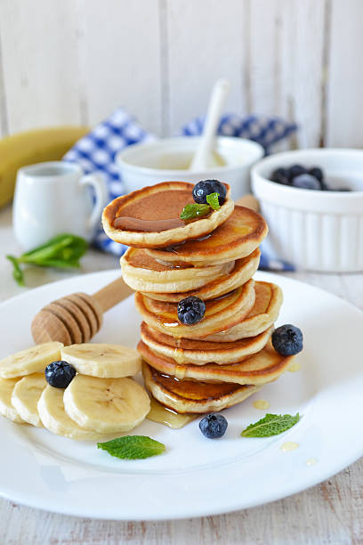 istock Pancakes for breakfast with honey and blueberries 607746586