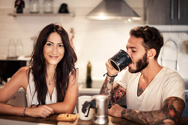 istock Young couple at home - Morning breakfast time 607746862