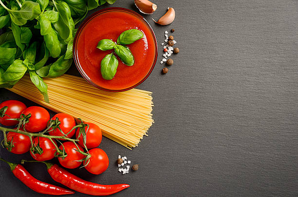 istock Pasta, vegetables, herbs and spices for Italian food 607747036