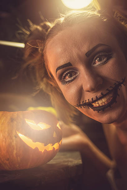 istock Horrible girl with scary mouth and eyes 607748254