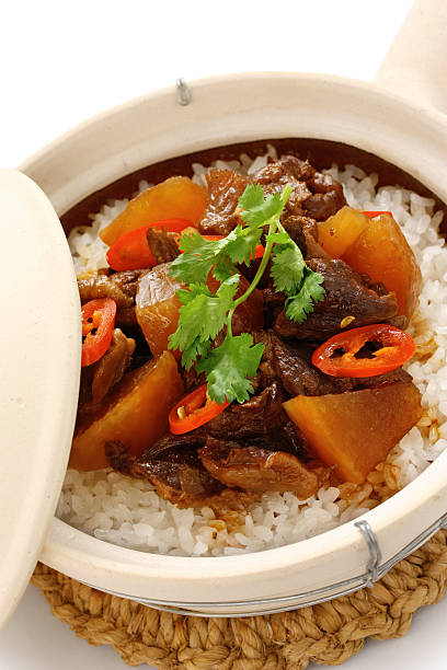 istock beef with rice in clay pot, cantonese food 607748876