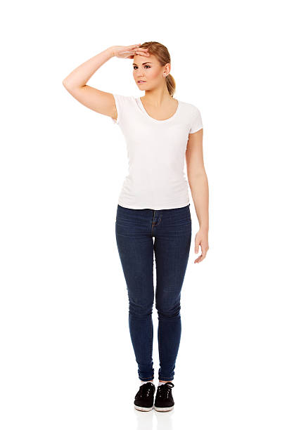 istock Young woman looking into the distance. 607751290