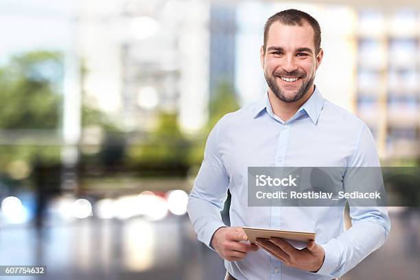 Man In Office With Tablet Computer Stock Photo - Download Image Now - Men, Button Down Shirt, Businessman