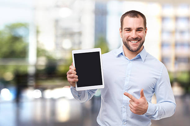 istock Happy businessman in blue shirt 607754708