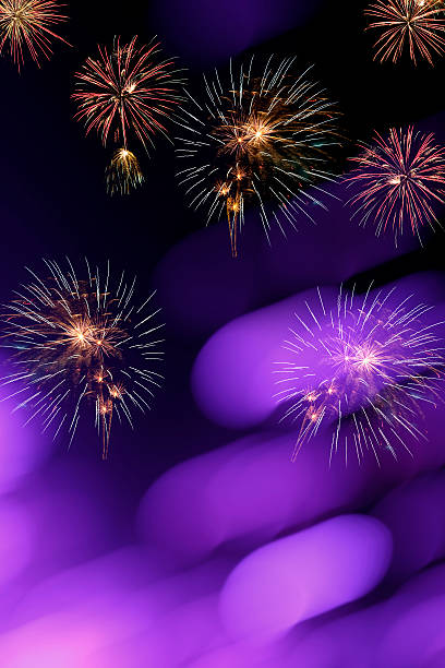 istock Fireworks and defocused lights on a black background 607755648