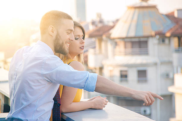 istock young couple on the terrace, business concept, sun 607755736