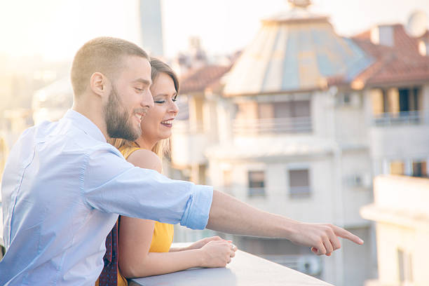 istock young couple on the terrace, business concept, sun 607755930