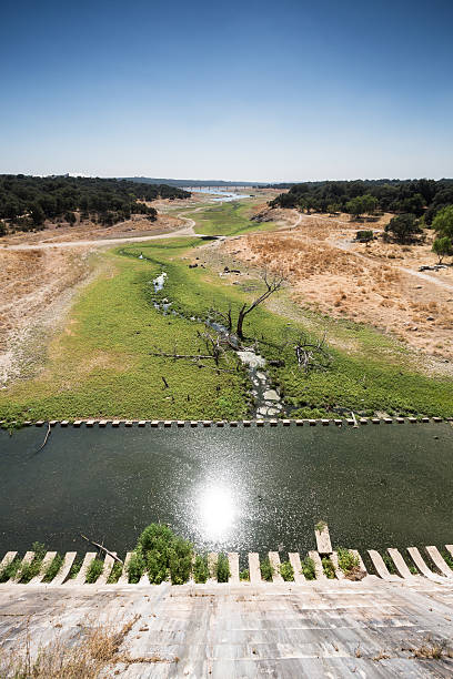 istock Effect of drought in a reservoir. 607757178