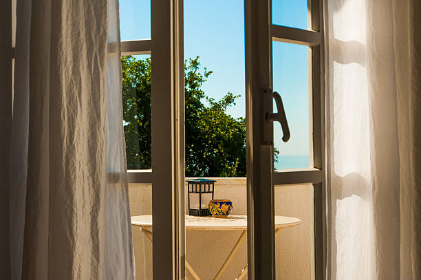 Open window with relaxing mediterranean viewin the morning