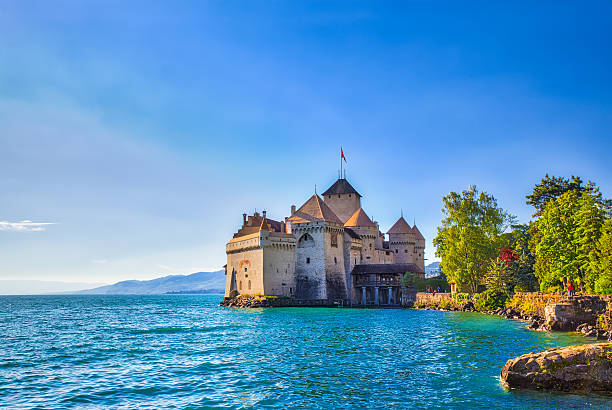 Beautiful view of Chillon castle in sunshine Montreux, Switzerland - July 16, 2016: Close view of Chillon castle in the sunshine, on the lakeside of Lake Geneva, Montreux, Canton of Vaud, Switzerland montreux photos stock pictures, royalty-free photos & images